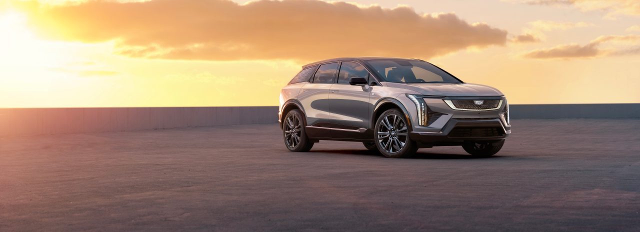 2025 Cadillac Optiq in white at sunset